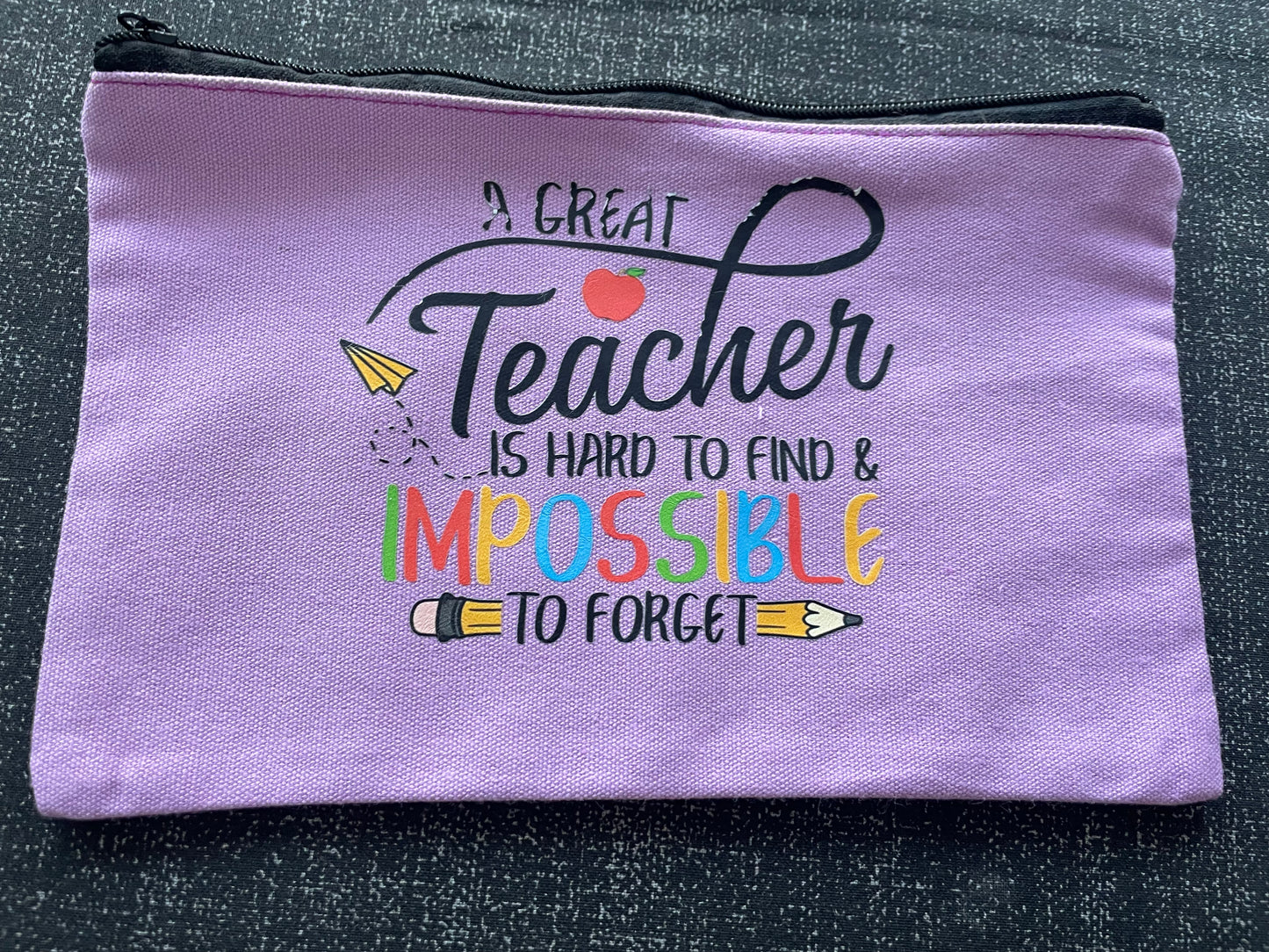 Flawesome find - paarse etui ‘beste leraar’