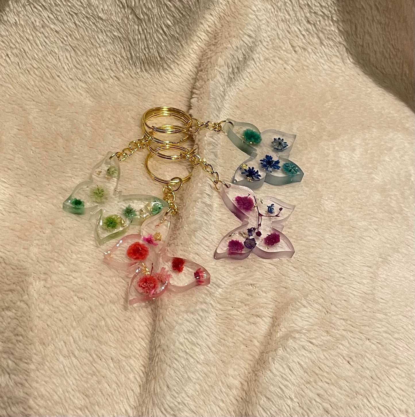 Bloemige vlinder sleutelhangers