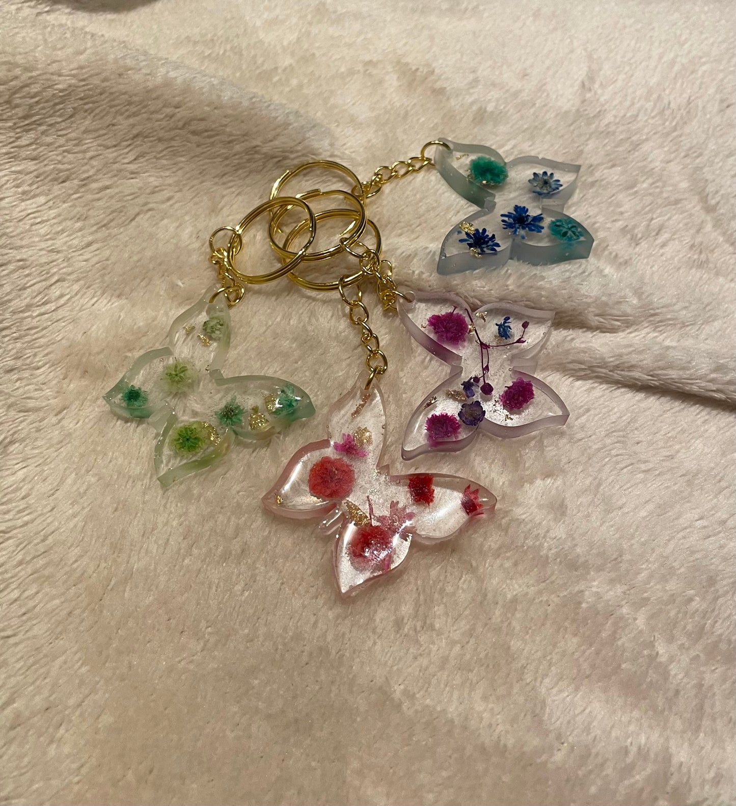 Bloemige vlinder sleutelhangers