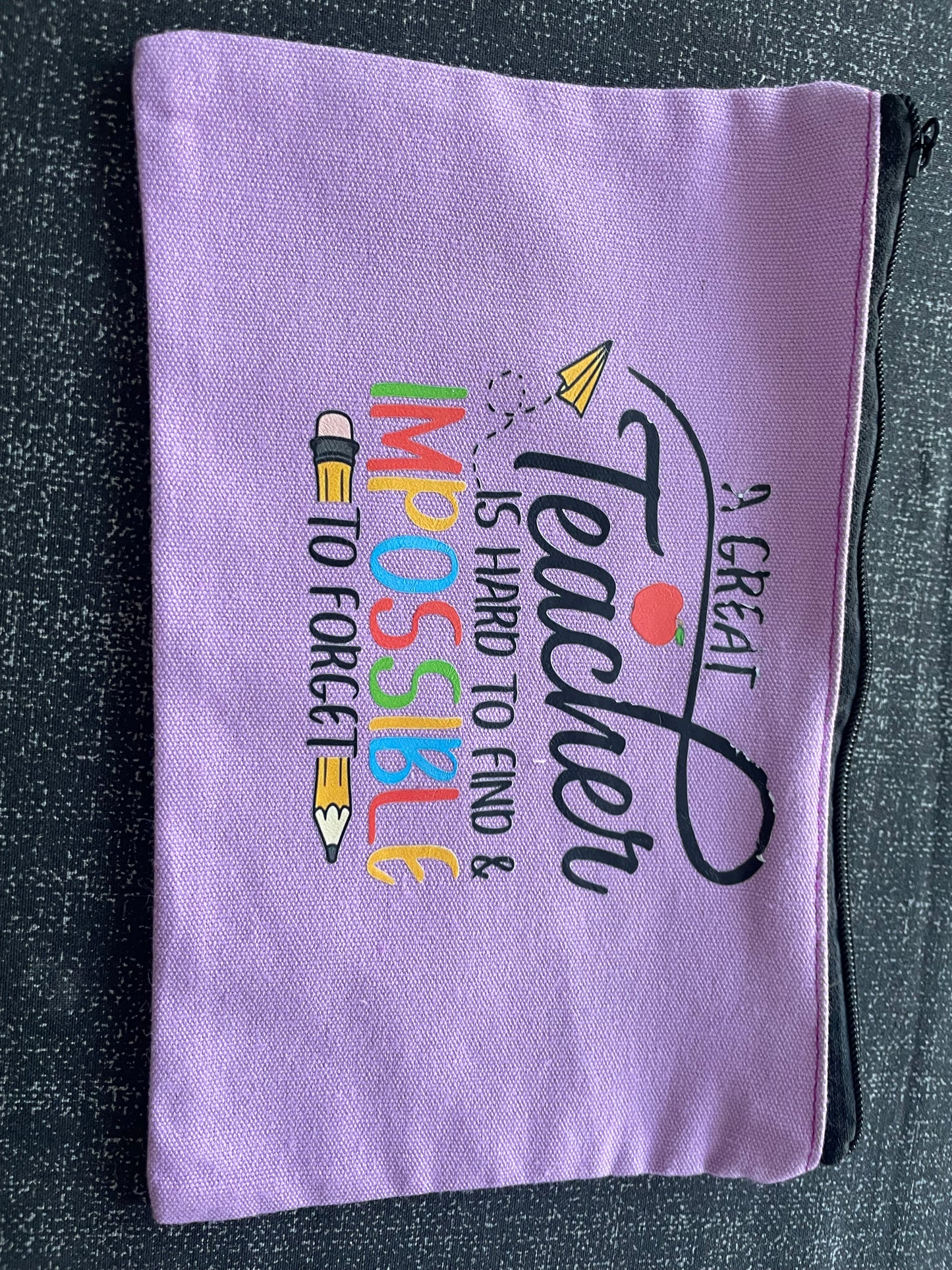 Flawesome find - paarse etui ‘beste leraar’